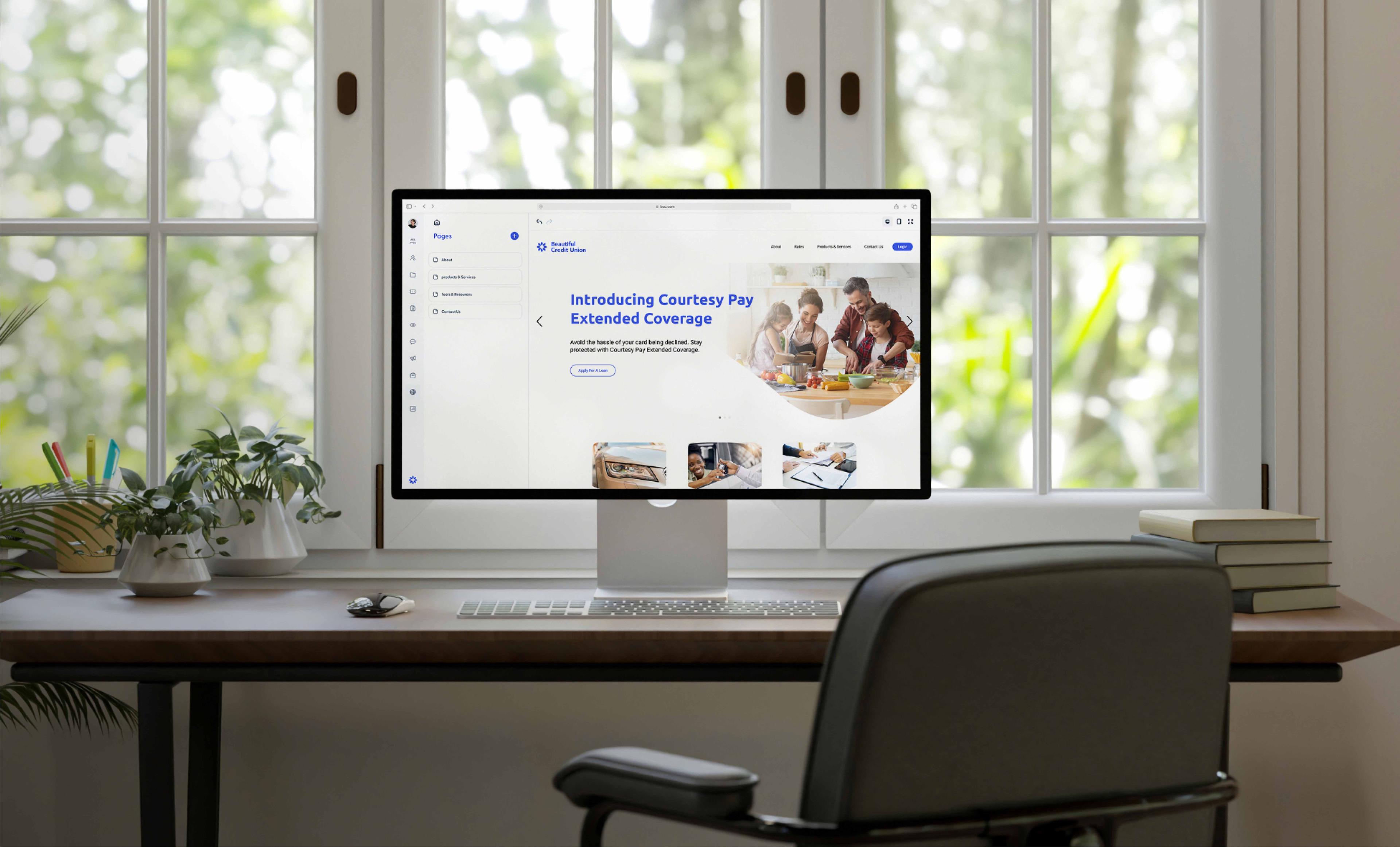 Woman smiling while looking at her computer